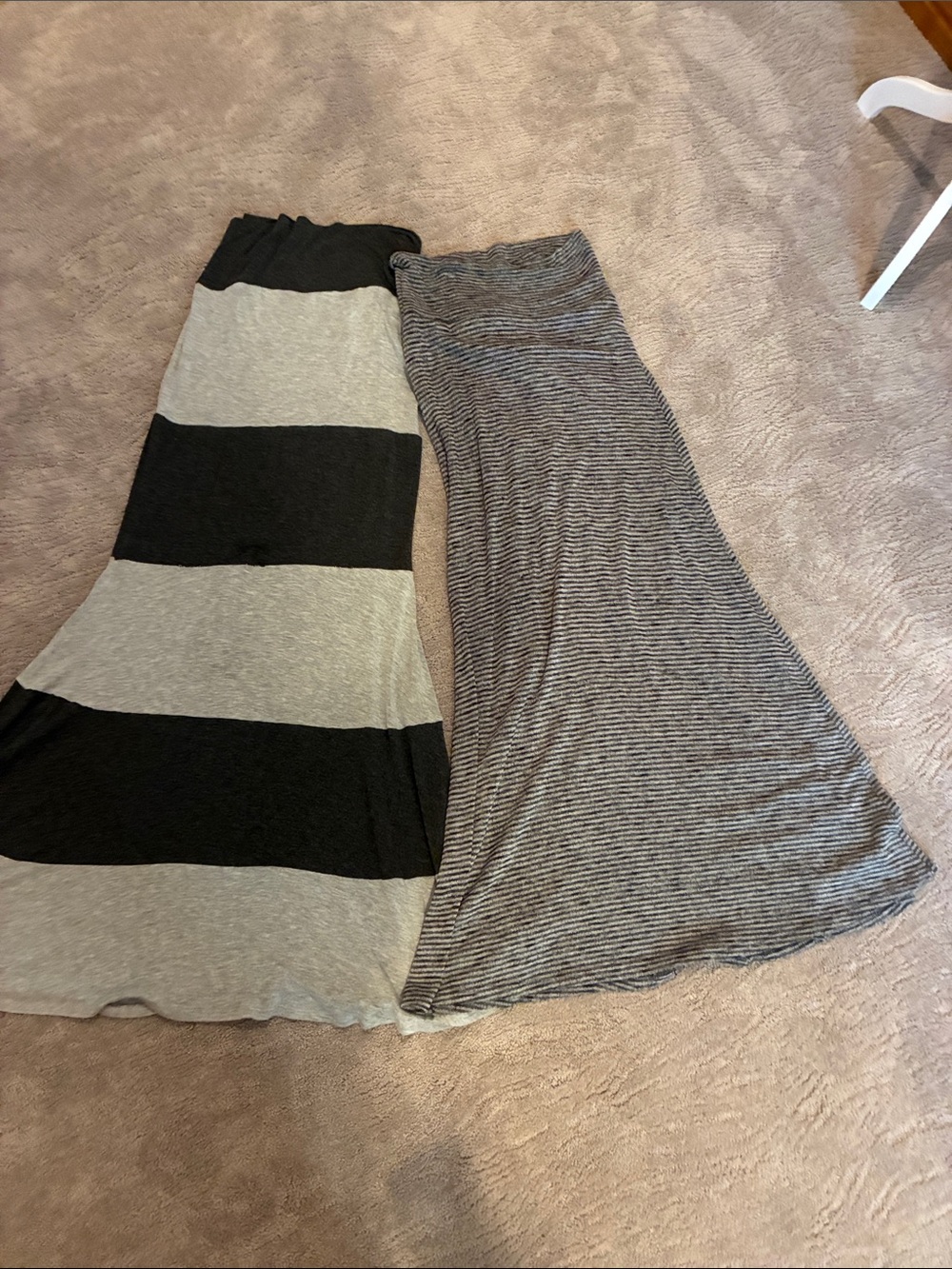 Two light gray and dark gray maxi skirts. Good condition.